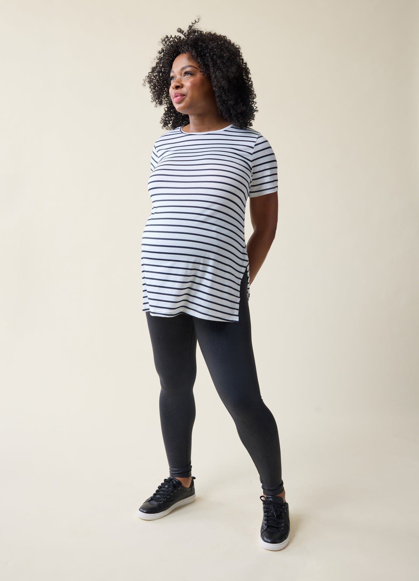 Hope is 5’8”, 8 months pregnant, and wearing size medium||jet black